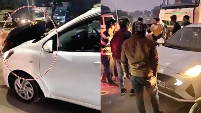 <b>हाईवे-पर-हैरतअंगेज-घटना:-मुरादाबाद-में-पति-ने-बोनट-पर-लटककर-बचाई-पत्नी,-वीडियो-हुआ-वायरल</b>